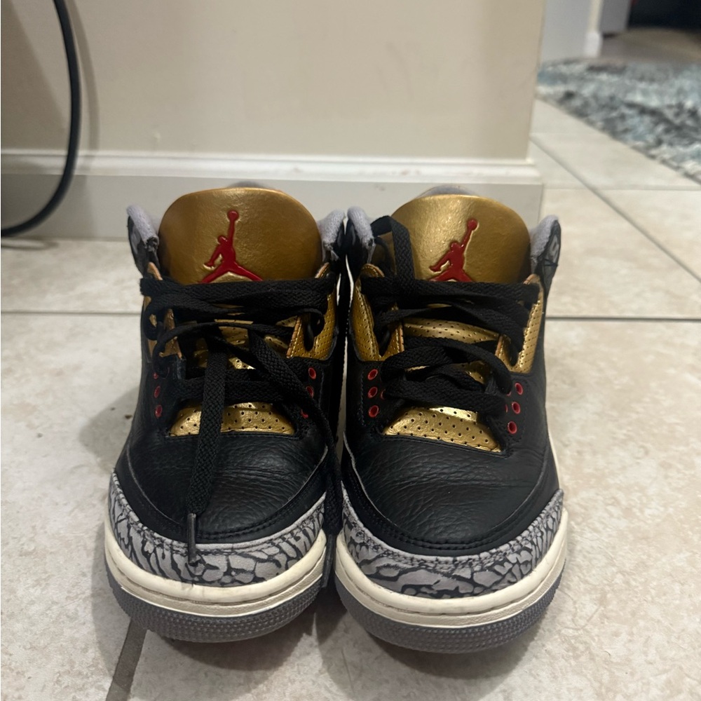 Air Jordan 3 Retro Black and Gold Sneakers